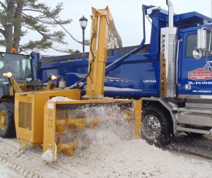 RPM215 loader-mounted snow blower | Snow truck loading